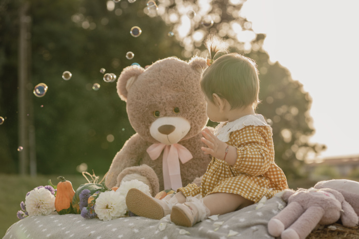 Baby with teddy bear